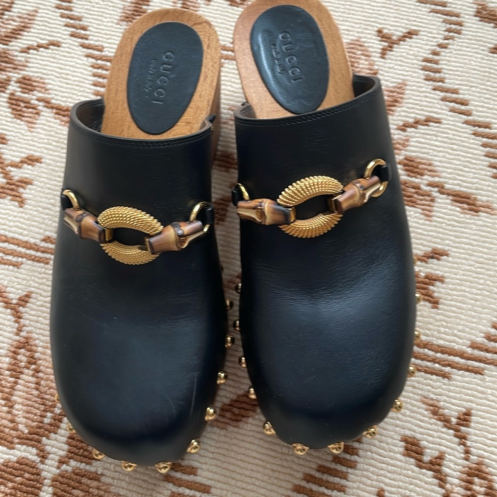 Gucci clogs black leather, wood platform horseshoe detail as shown in photo